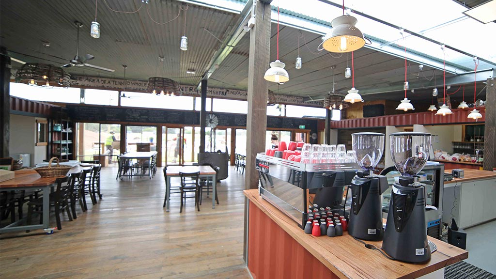 Reclaimed timber flooring recycled timber tables hospitality cafe commercial retail fitout sustainable ecofriendly renovation build restaurant melbourne victoria australia